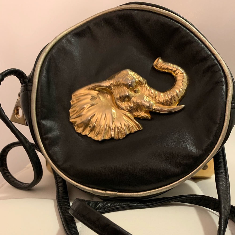 Vintage 80s leather back with Gold hardware